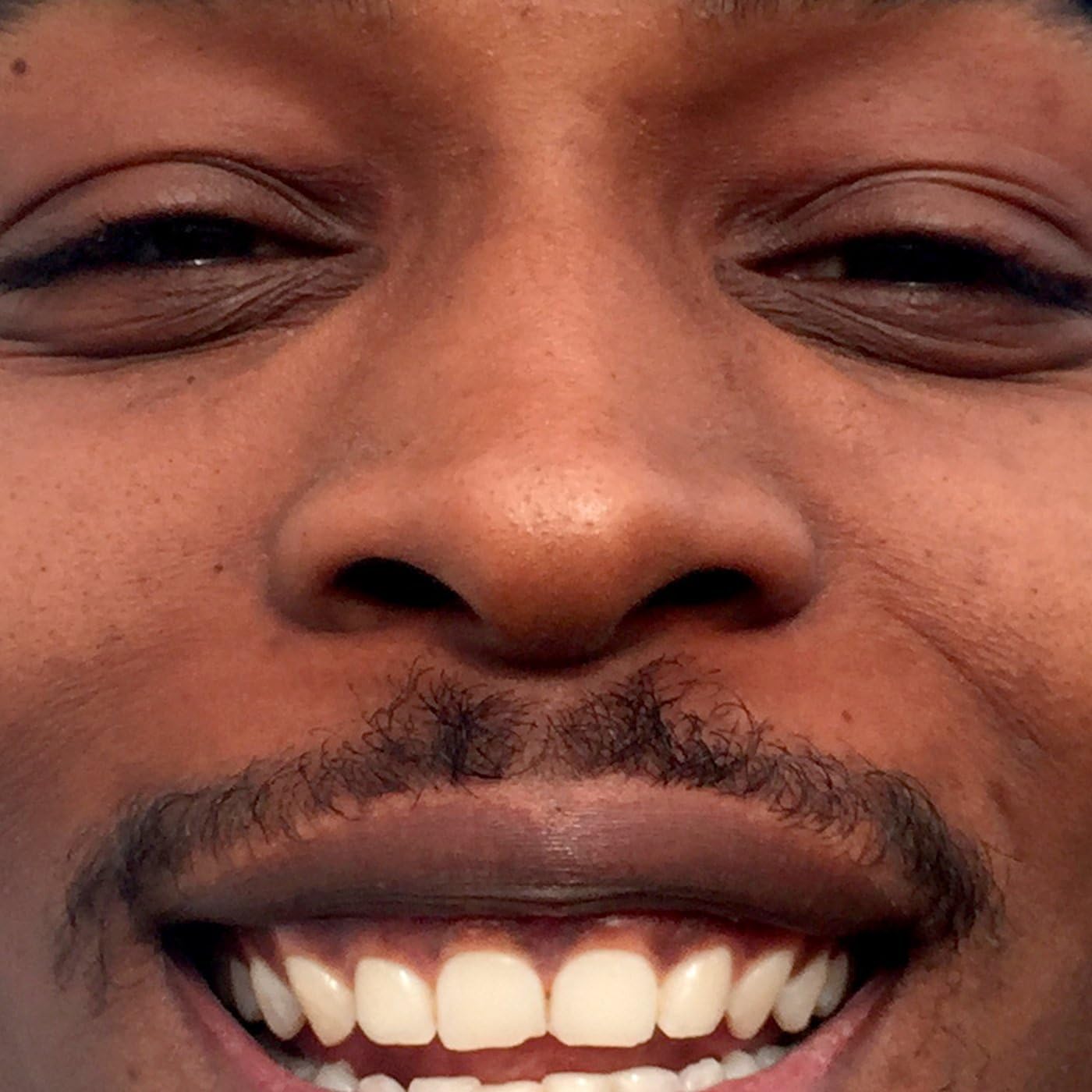 Vinyl record cover featuring a minimalist black and white portrait of Jme.