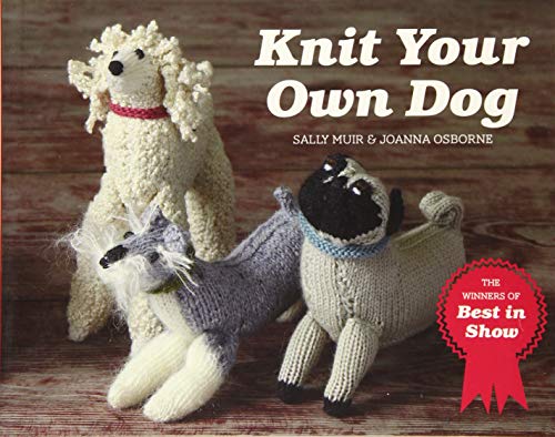 Knit book cover featuring three knitted dog figures on wood.