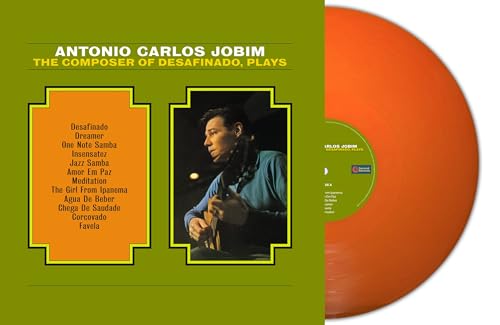 Antonio Carlos Jobim vinyl record with orange disc and green cover.