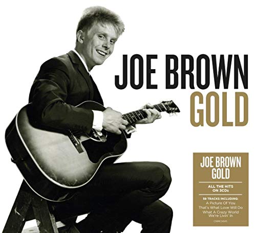 Joe Brown holding a guitar on the album cover for "Gold.