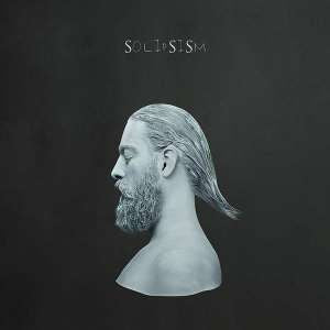 Album cover: grayscale portrait of a man with long hair.