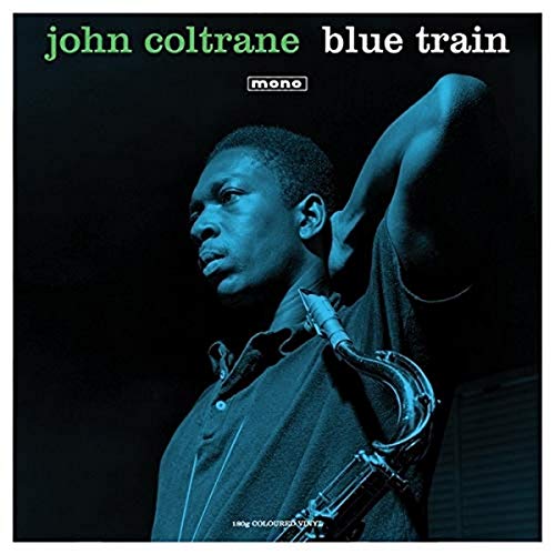 John Coltrane’s “Blue Train” vinyl album cover featuring a portrait with saxophone.