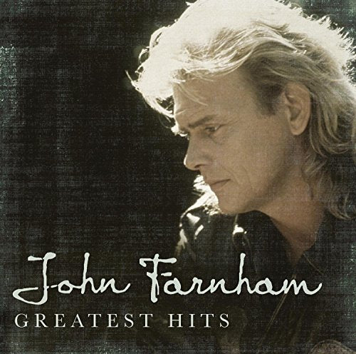 CD cover featuring a portrait of singer John Farnham, with text.