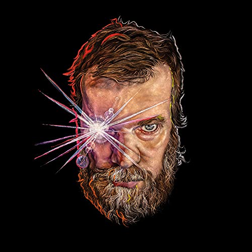 Portrait of John Grant with radiating light effect from his eye.