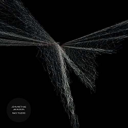 Black album cover with abstract white lines and artist/title text.