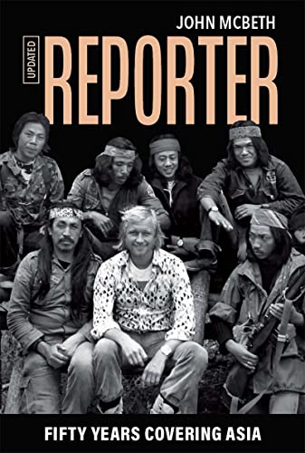 Book cover: āReporter,ā showing a group of people in Asia, updated edition.