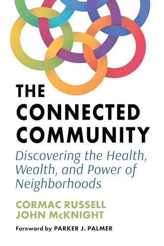 Book cover: colorful linked rings above title, "The Connected Community.