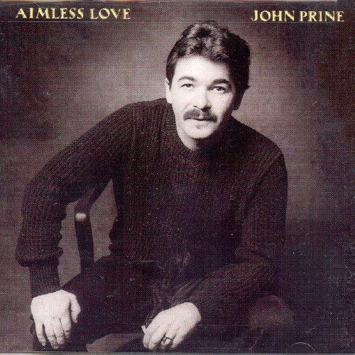 Album cover featuring John Prine sitting, wearing a dark sweater, with sepia-toned background.
