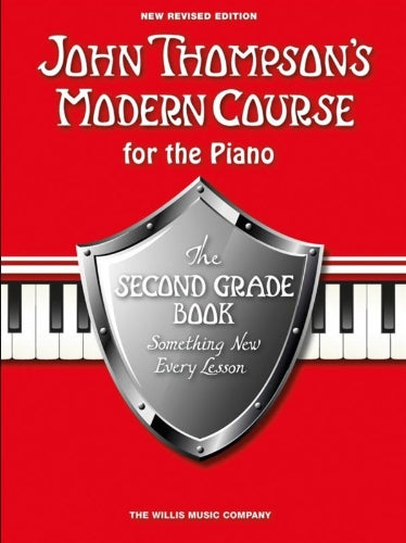 Red piano book cover with shield design, titled “The Second Grade Book.”