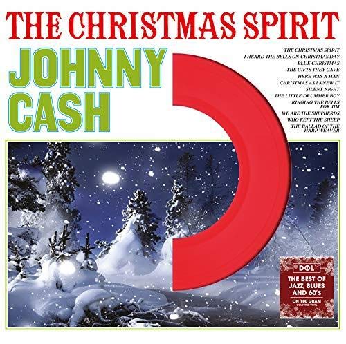 Johnny Cash Christmas album cover with snowy landscape and red arc.