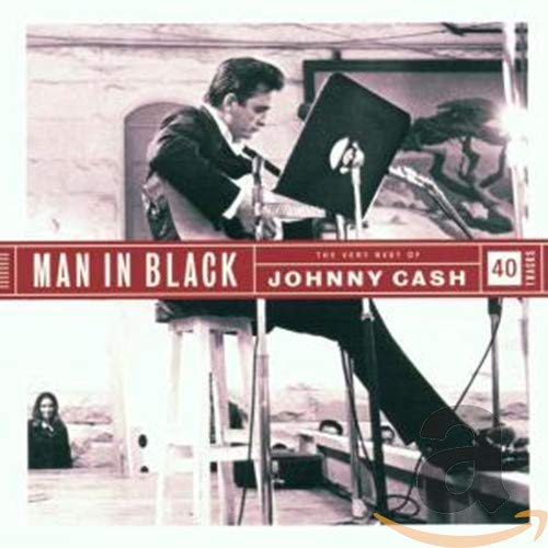 Johnny Cash in black suit playing guitar, album cover image.