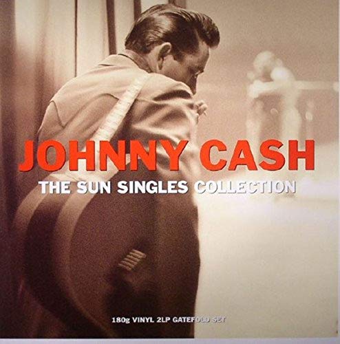 Johnny Cash album cover, side view of musician with red text.