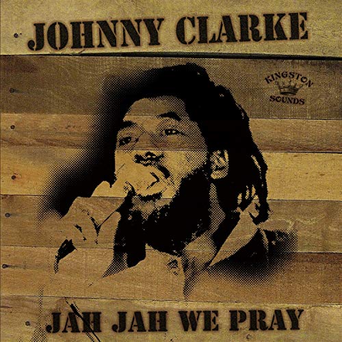 Album cover featuring Johnny Clarke over a wood grain background with text.