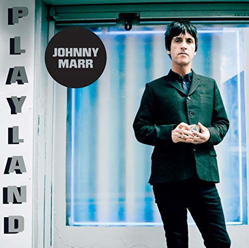 Johnny Marr album cover: portrait of a man in a black suit.