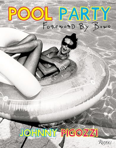 Black and white photo of a woman lounging in a pool on an inflatable.