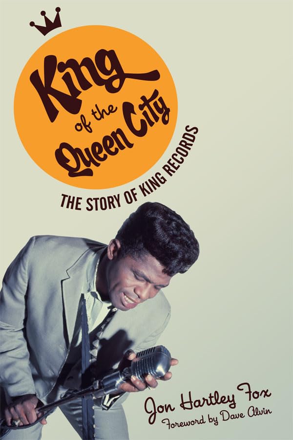 Book cover featuring a musician with a microphone and the title “King of the City.”