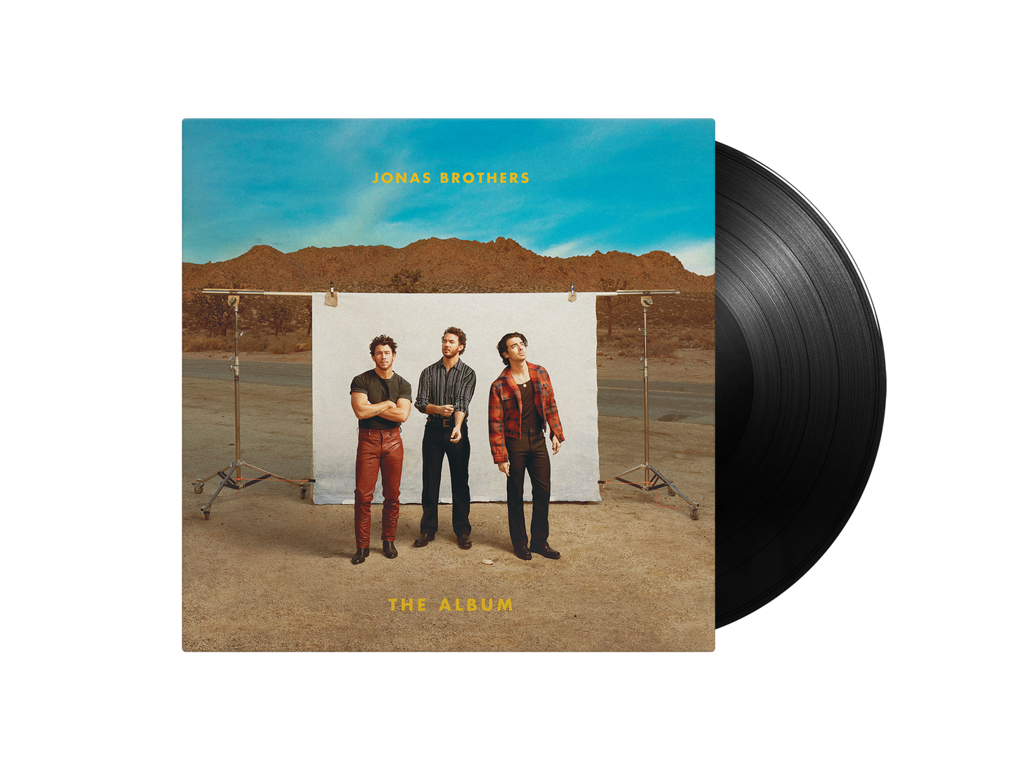 Jonas Brothers album cover with three men and a black vinyl record.