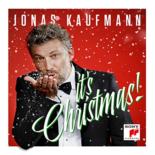 Jonas Kaufmann album cover, red background with falling snow, portrait.