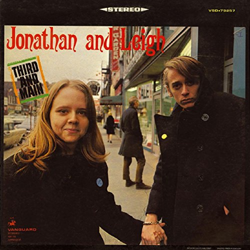 Album cover featuring a man and woman holding hands on a city street.