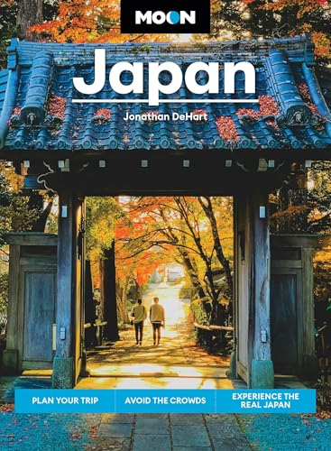 Book cover showing two people walking through a traditional Japanese gate in autumn.