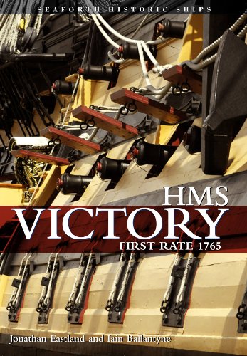 Close-up of the side of HMS Victory showing gun ports, cannons, and rigging.