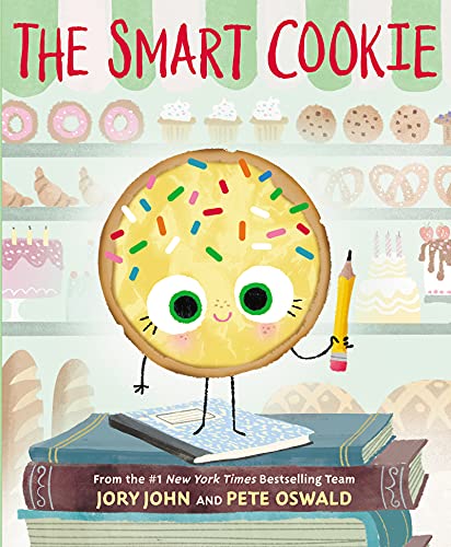 Book cover featuring a smiling sprinkle cookie holding a pencil atop a stack of books.