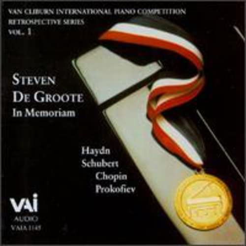 CD cover with piano keys, ribbon, and a gold medal illustration.