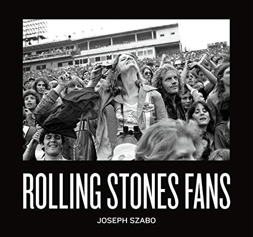 Black and white photo of a large crowd at a Rolling Stones concert.