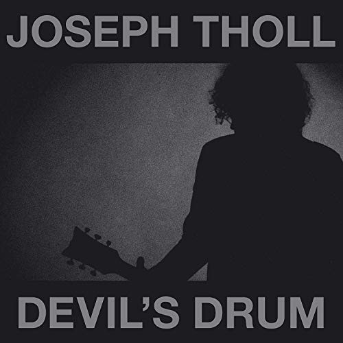CD cover for Joseph Tholl’s “Devil’s Drum” featuring a silhouetted guitarist.