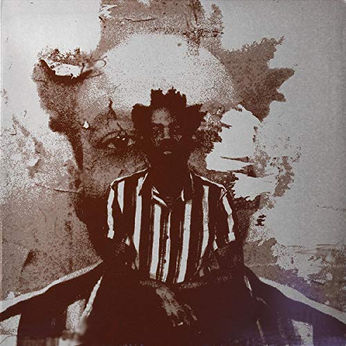 Sepia-toned portrait of Josh Johnson in a striped shirt, distressed texture.