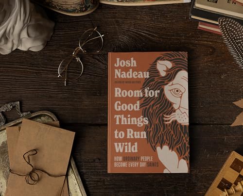 Book cover with a lion illustration, glasses, and scattered papers.