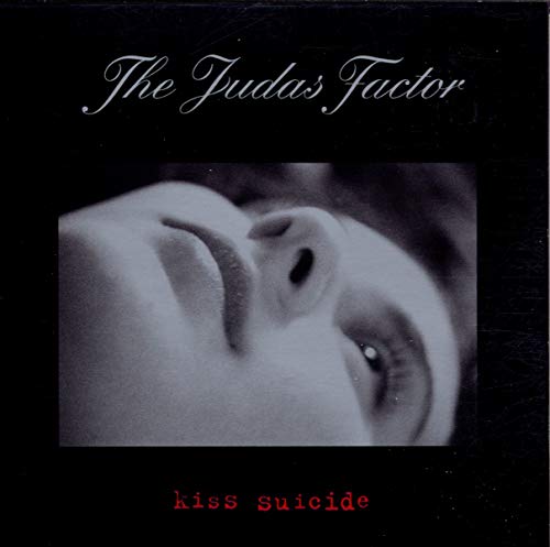 CD cover: black background, close-up of a face, red text "kiss suicide".