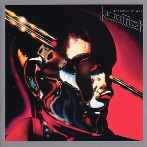 āStained Classā album cover: a face distorted by red and black swirls.