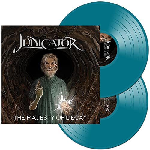 Two teal vinyl records with cover art depicting an old man and dark trees.