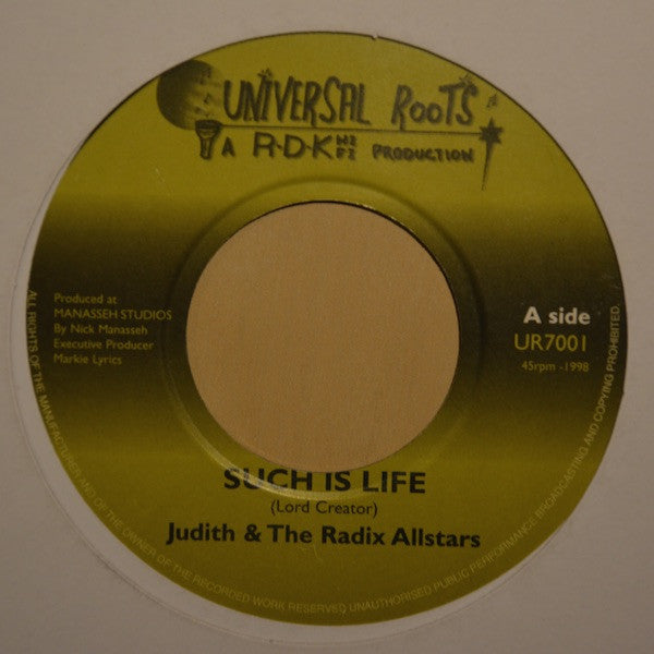 Yellow vinyl record label with text: “Such Is Life” by Judith & The Radix Allstars.