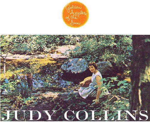 "Album cover with Judy Collins kneeling in a forest, white text at the bottom."