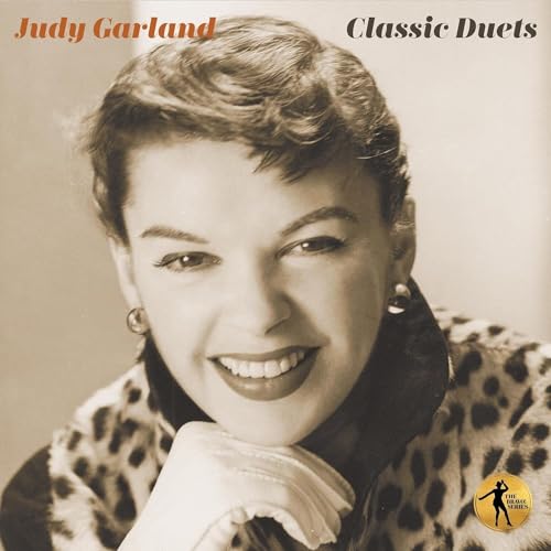 Judy Garland portrait on album cover, sepia tone, smiling, wearing earrings.