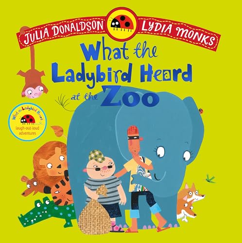 Colourful children's book cover with cartoon animals and two boys beside a large elephant.