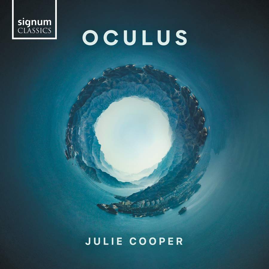 CD cover featuring a circular landscape panorama against a dark blue background.