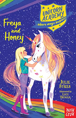Girl with long blonde hair touches a white unicorn with a gold horn.