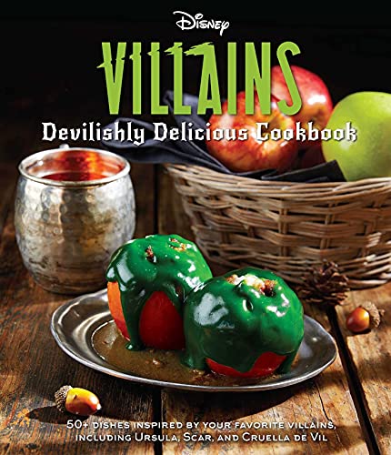 Disney Villains cookbook with apples, a drink, and green-glazed treats.