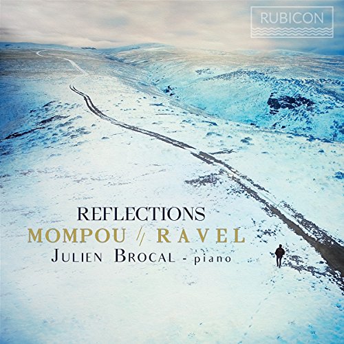 CD cover: snowy landscape with a winding road and lone figure.