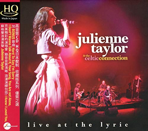 Julienne Taylor album cover: singer with band performing on stage.