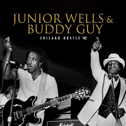 Junior Wells and Buddy Guy performing with guitars, black and white photo.