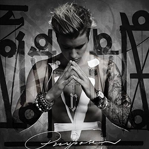 Black and white album cover featuring Justin Bieber with hands pressed together.
