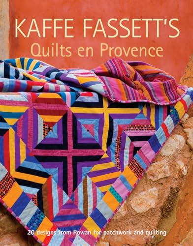 Book cover featuring a colorful, geometric patchwork quilt draped over stone.