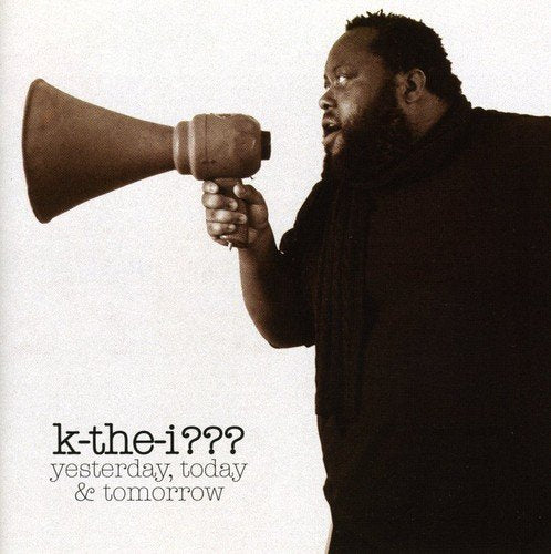 Black and white album cover featuring a man speaking into a megaphone.