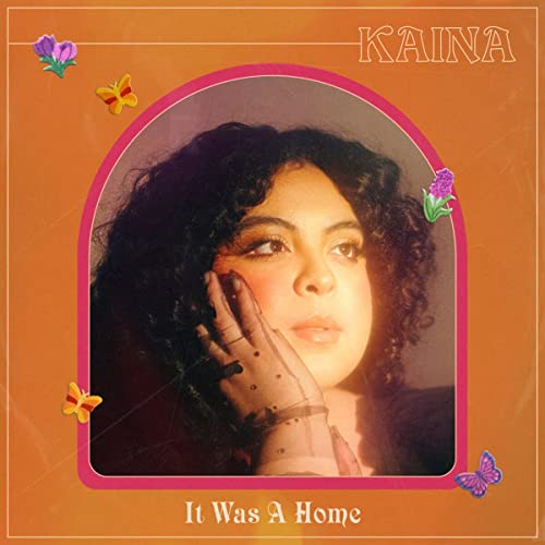 “It Was A Home” CD cover featuring a portrait of a woman with curly hair.