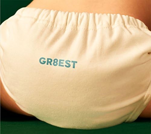 A baby wearing cream-colored cloth diaper with the text GR8EST printed in blue.