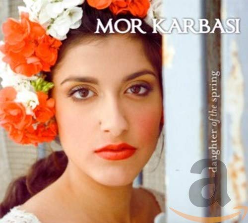 Woman with flower crown on CD cover, album title "Daughter of the Spring".